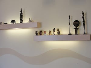 minimalist shelves on a bedroom wall